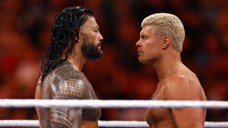 Roman Reigns and Cody Rhodes, face to face, nose to nose
