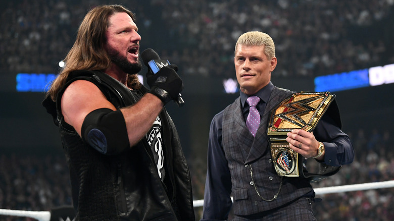 Cody Rhodes and AJ Styles share the ring