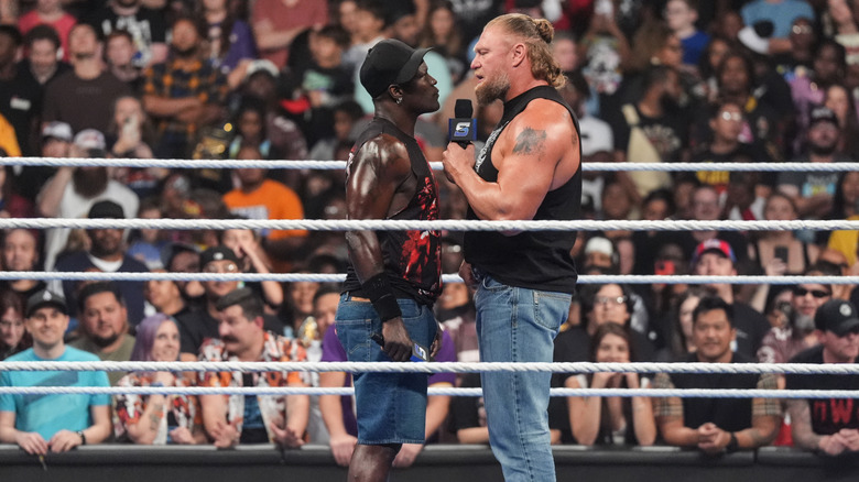 R-Truth and Brock Lesnar in the ring on WWE SmackDown
