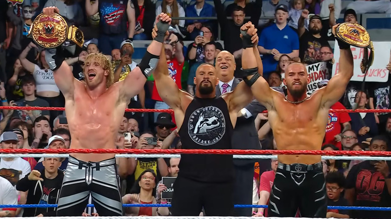 The Vision celebrate at the end of Saturday Night's Main Event