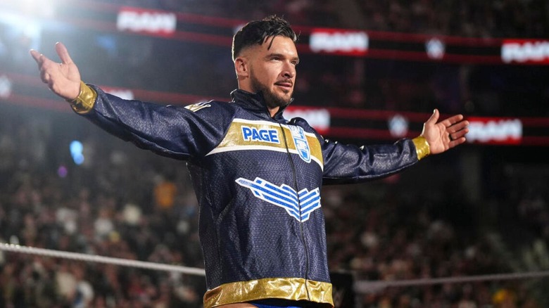 Ethan Page poses in the ring during his entrance on an episode of "WWE Raw."