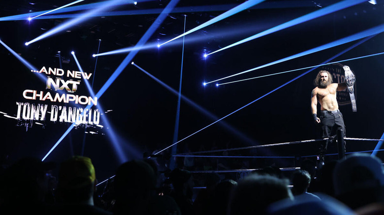 Tony D'Angelo holds up the NXT Championship at Stand & Deliver