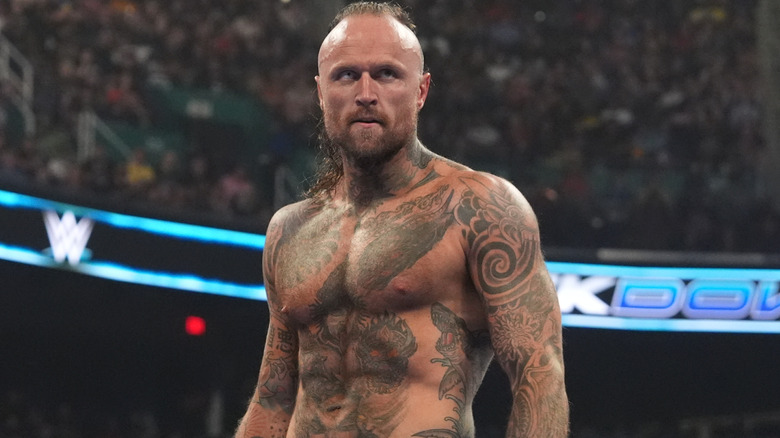 Aleister Black staring intensely