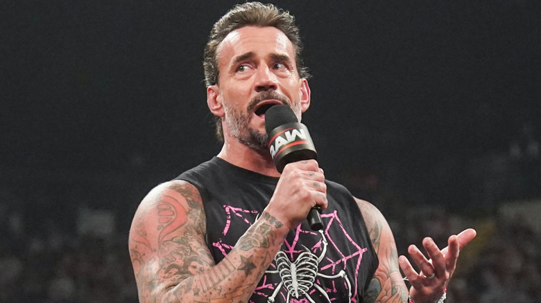 CM Punk during a promo segment alongside his wife, AJ Lee, during an episode of "Monday Night RAW," 2025.