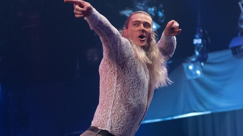 Pretty Deadly's Elton Prince poses on the ropes and smiles to fans during an episode of 