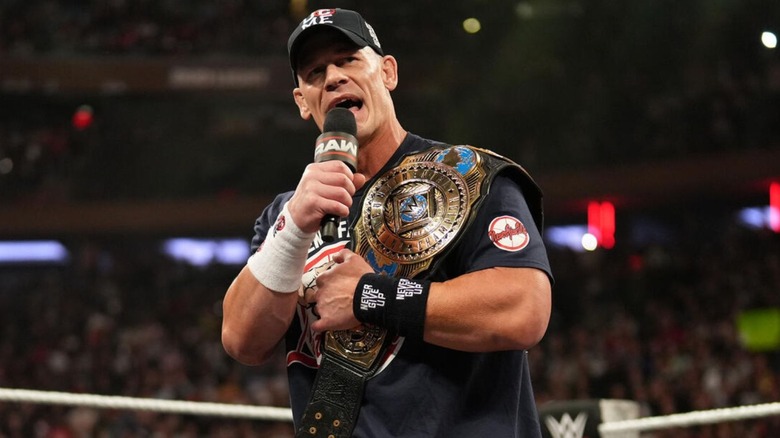 John Cena cuts a promo in the ring, holding the Intercontinental Championship, to open up an episode of 