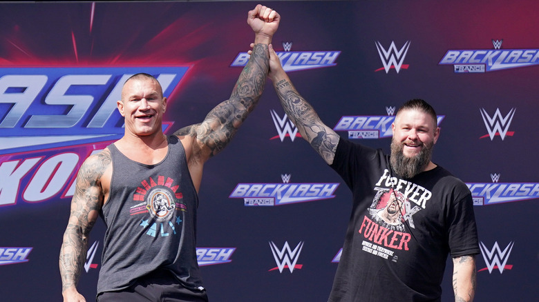 Randy Orton and Kevin Owens on stage