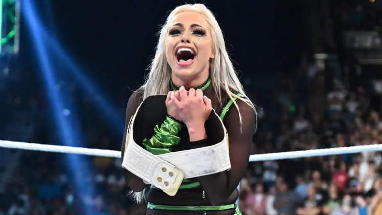 Liv Morgan holding WWE SmackDown Women's Championship