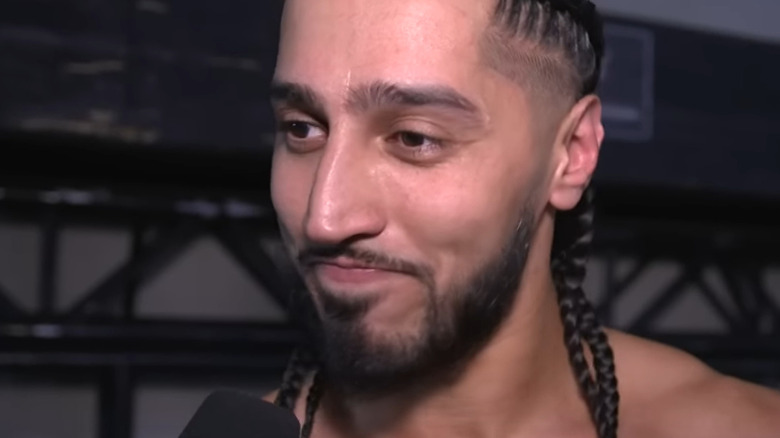 Ali in a backstage segment