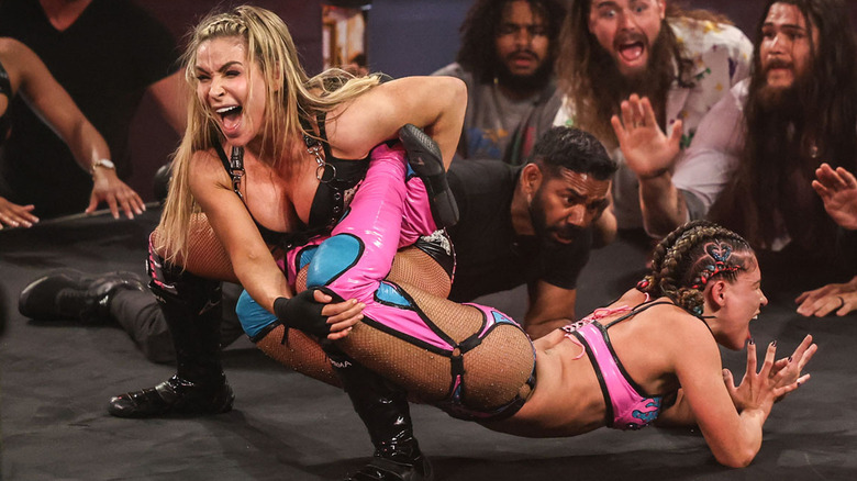 Natalya performing sharpshooter