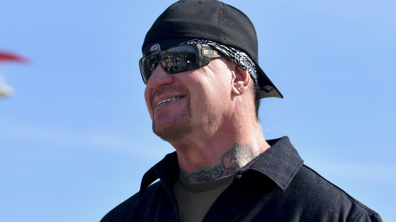The Undertaker wearing sunglasses