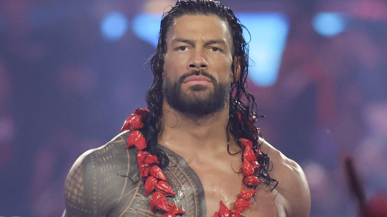 Roman Reigns wearing the Ula Fala around his neck
