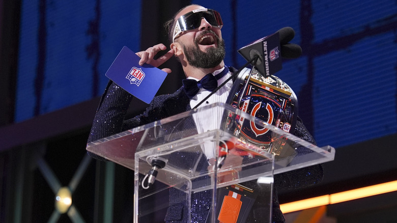 Seth Rollins reacts to the crowds cheer during the NFL Draft