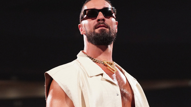Seth Rollins standing in the ring