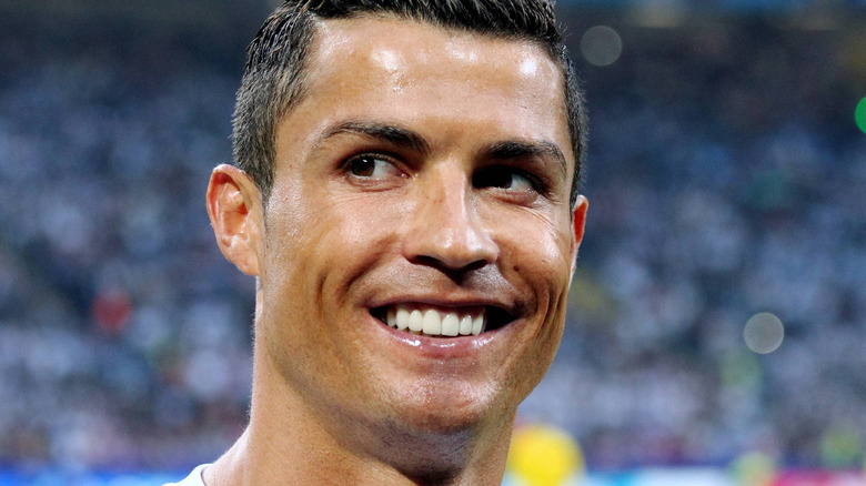 Cristiano Ronaldo smiling on the pitch