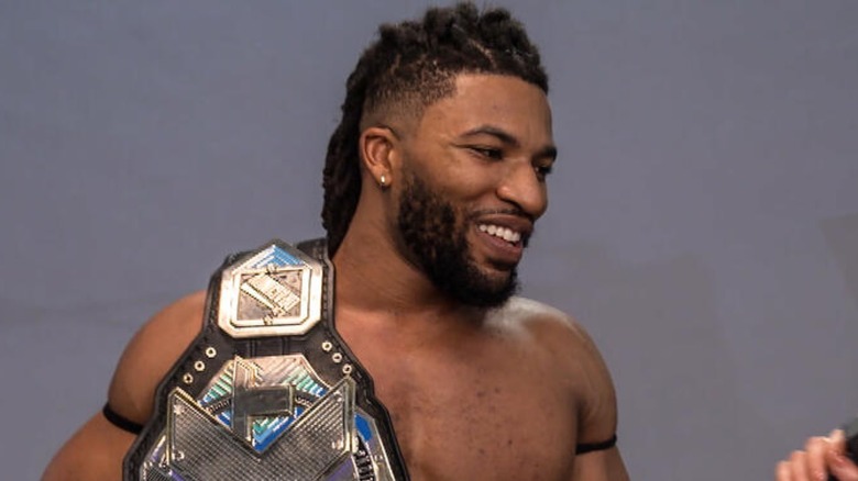 Trick Williams with his newly won NXT Championship