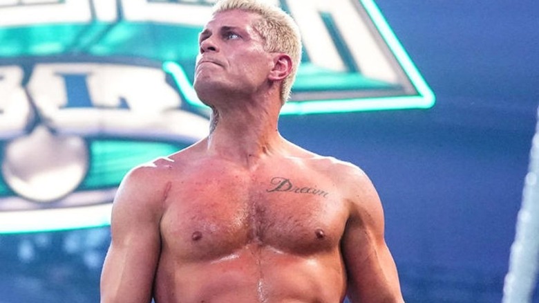 Cody Rhodes stands on the turnbuckle in front of the WrestleMania 40 sign