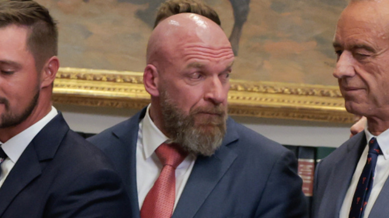 Triple H looking over his shoulder at the White House