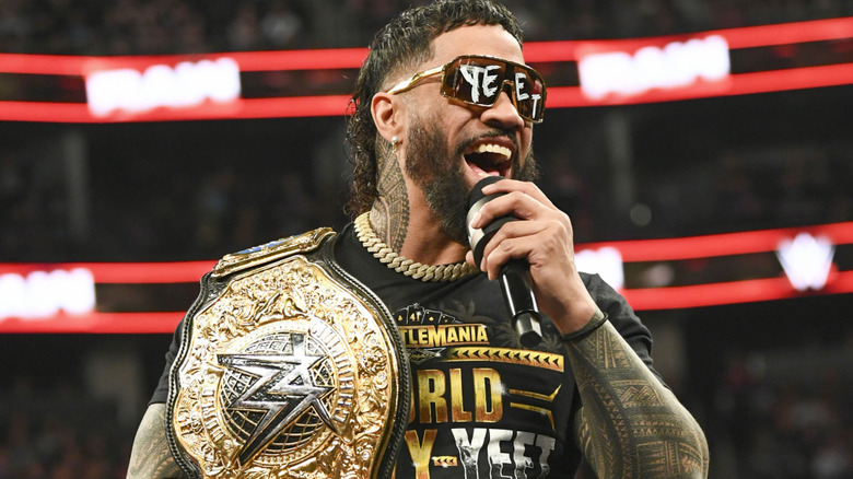 Jey Uso holding a microphone