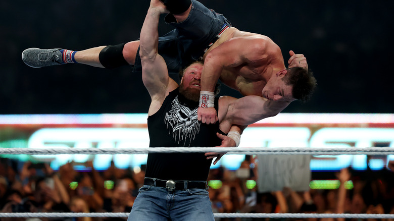 Brock Lesnar throws John Cena during the WWE 2025 SummerSlam at MetLife Stadium on August 03, 2025 in East Rutherford, New Jersey.