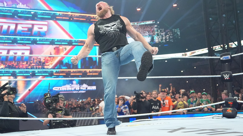 Brock Lesnar roars in the ring at WWE SummerSlam