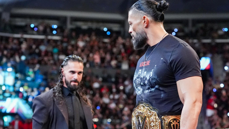 Roman Reigns and Seth Rollins in the ring