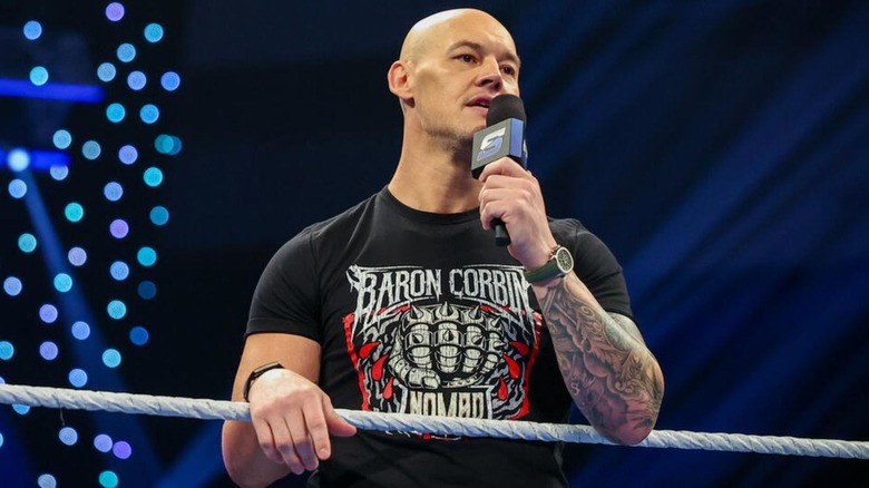 Baron Corbin leans over the ring ropes and cuts a promo on then-United States Champion Trick Williams during the July 31, 2026 edition of "WWE SmackDown."
