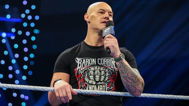 Baron Corbin leans over the ring ropes and cuts a promo on then-United States Champion Trick Williams during the July 31, 2026 edition of "WWE SmackDown."