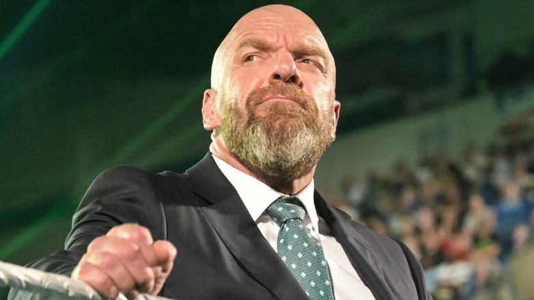 Triple H admires the crowd