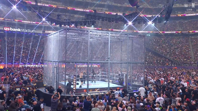 Lesnar and Femi in the Hell in a Cell cage