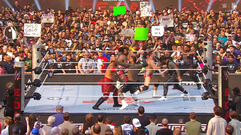 Everyone brawling with one another in the ring