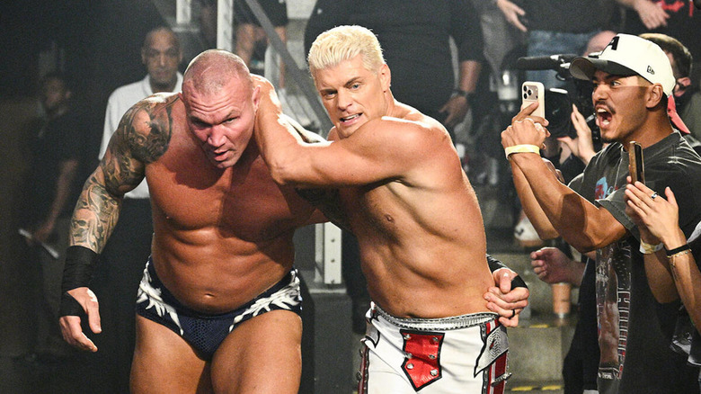 Cody Rhodes drags Randy Orton through the crowd