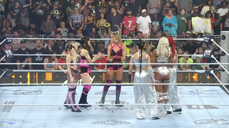 All six women inside the ring
