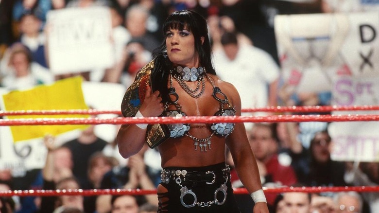 Chyna poses in the ring with the Intercontinental Championship.