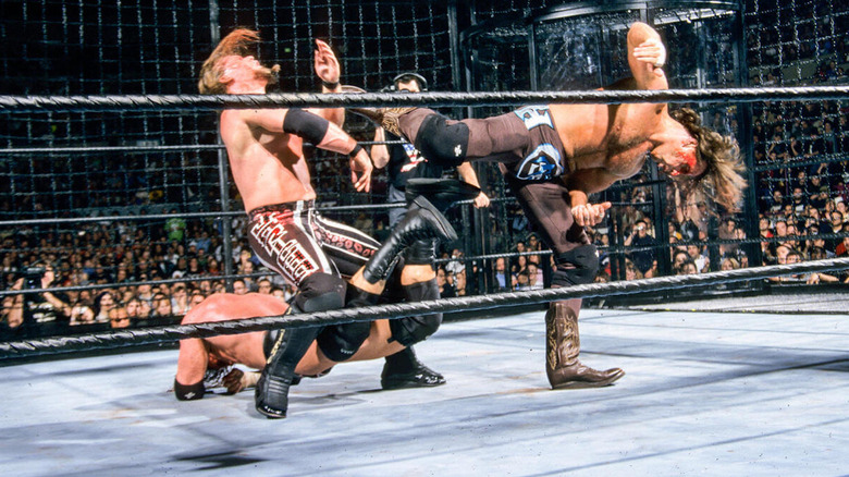 Shawn Michaels superkicks Chris Jericho