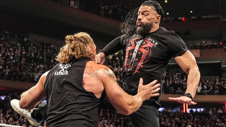Roman Reigns hits Brock Lesnar in the ring