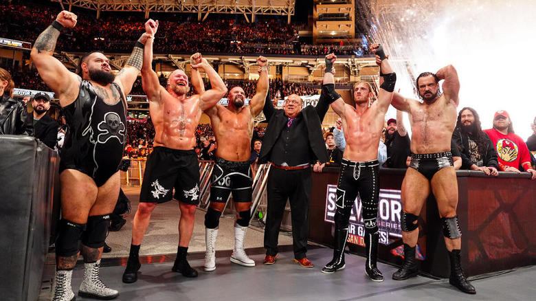 The victors of Men's WarGames celebrate