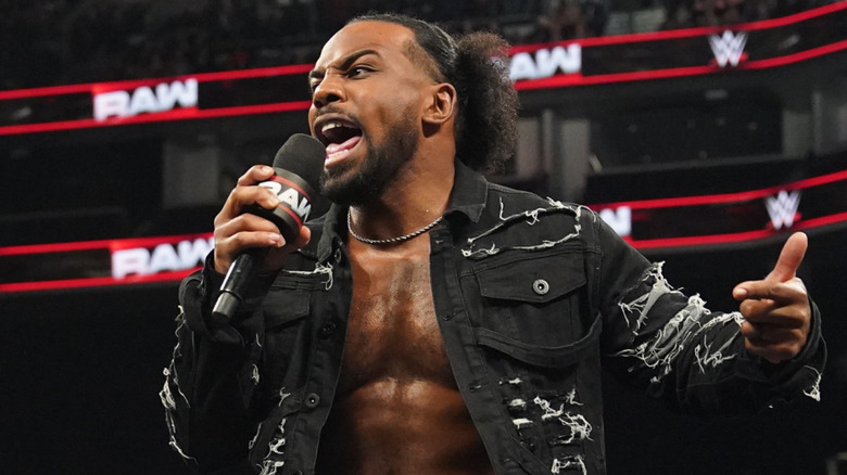 Kofi Kingston and Xavier Woods of The New Day speak during Monday Night RAW at Spectrum Center on February 17, 2025 in Charlotte, North Carolina.