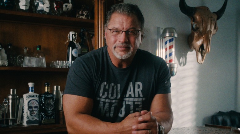 Al Snow sitting behind a desk