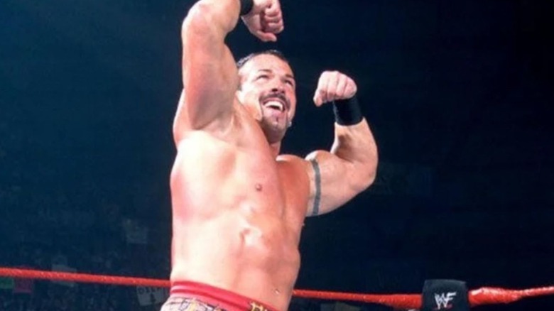 Buff Bagwell hits his signature pose in the ring during a match.