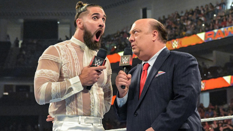 Seth Rollins with Paul Heyman