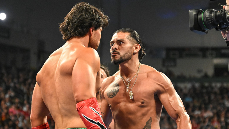 Santos Escobar and Berto argue