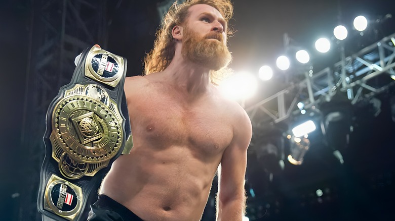 Sami Zayn holding Intercontinental title