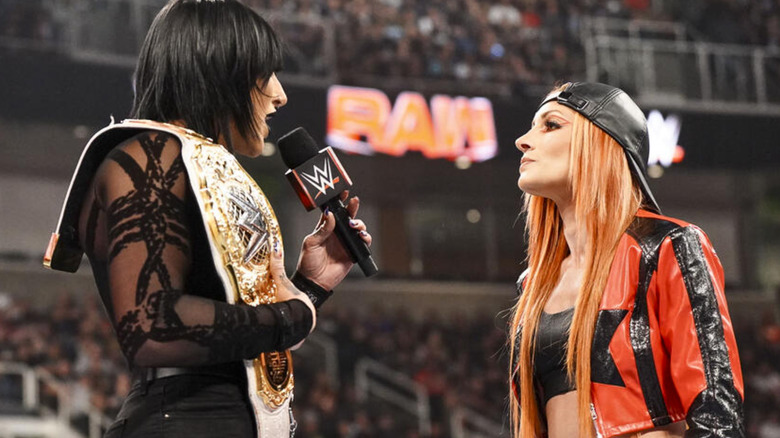 Rhea Ripley talking to Becky Lynch