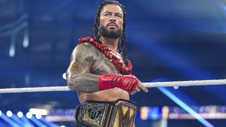 Roman Reigns wearing Undisputed WWE Universal Championship