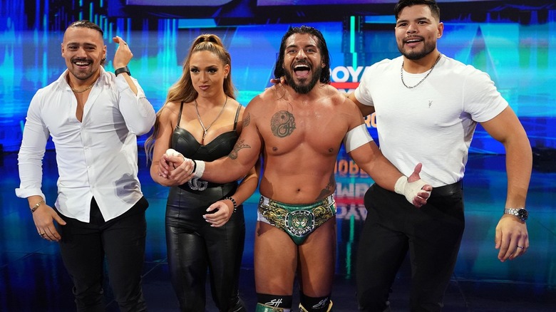 Santos Escobars stands alongside Berto, Angel Garza, and Elektra Lopez