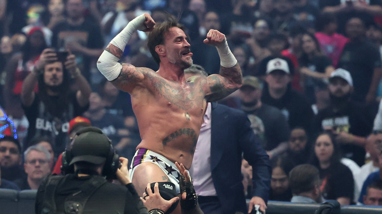 CM Punk flexes
