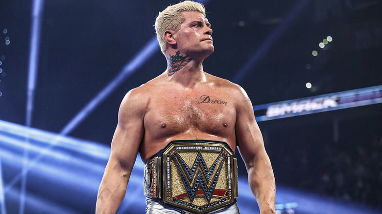 Rhodes wearing his Undisputed WWE Championship