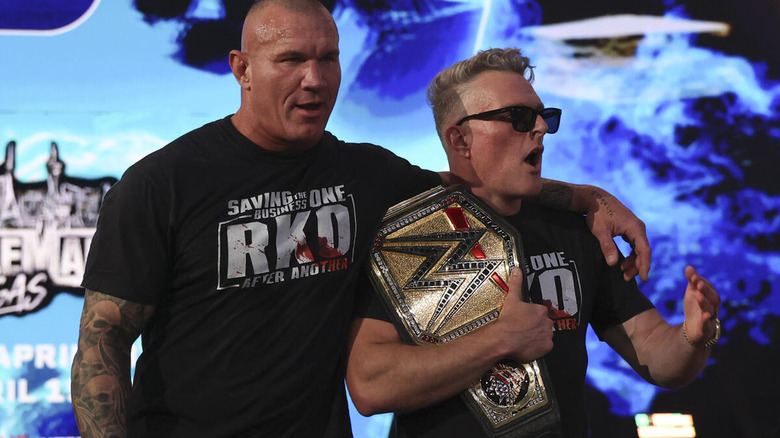 Randy Orton and Pat McAfee with the WWE Championship