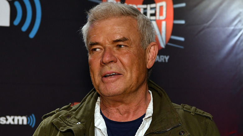 WWE Hall of Famer Eric Bischoff awaits a question from the "Busted Open" panel